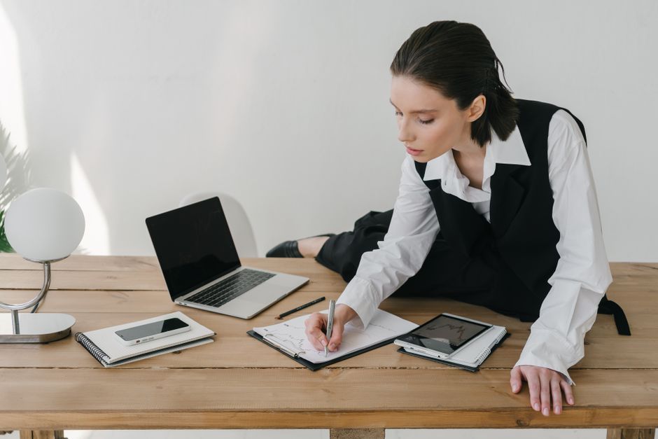 Professional strategist meticulously planning at a clean, modern desk, symbolizing the modern SEO playbook for business gr...